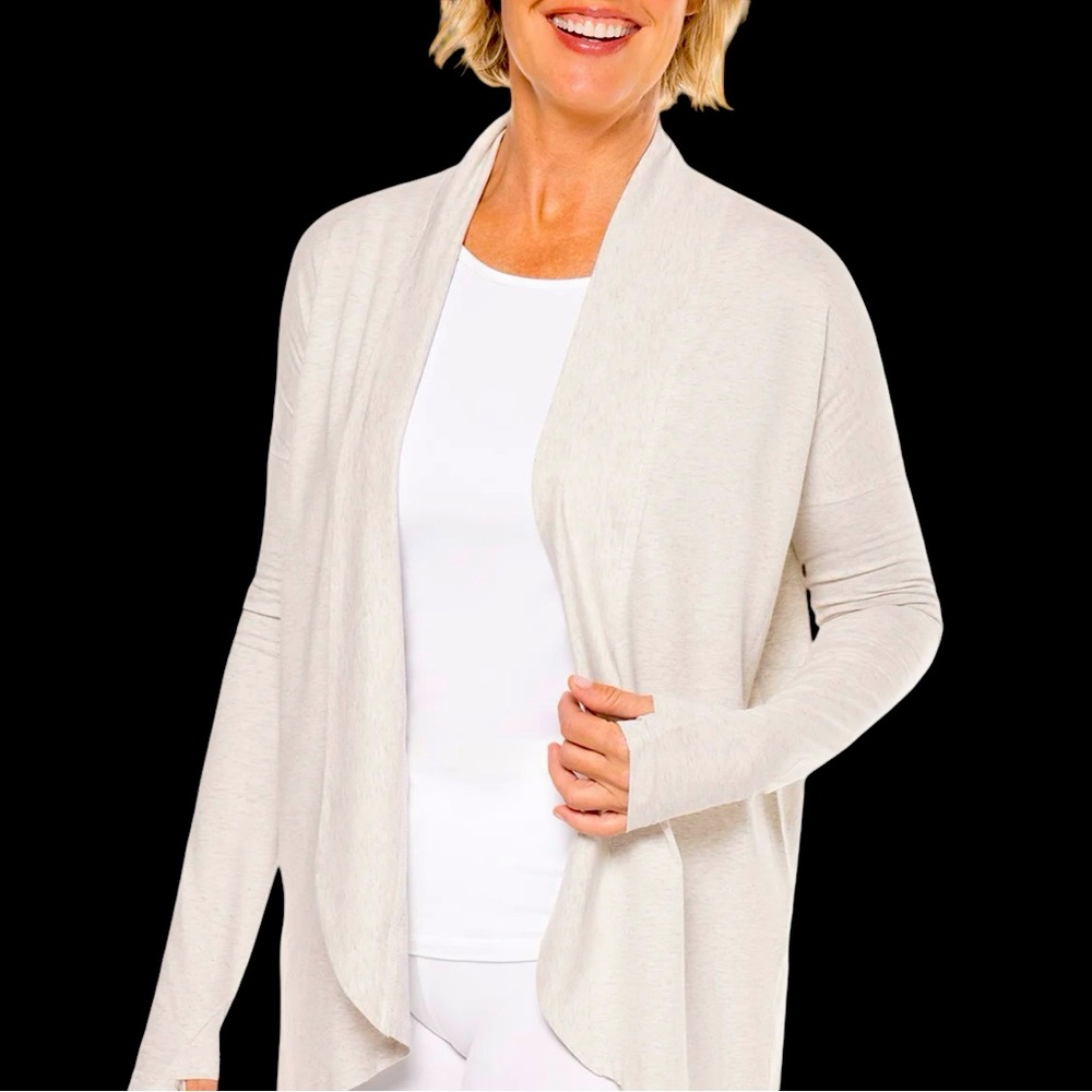 Coolibar protective wrap. UPF50 protection. White soft knit fabric.